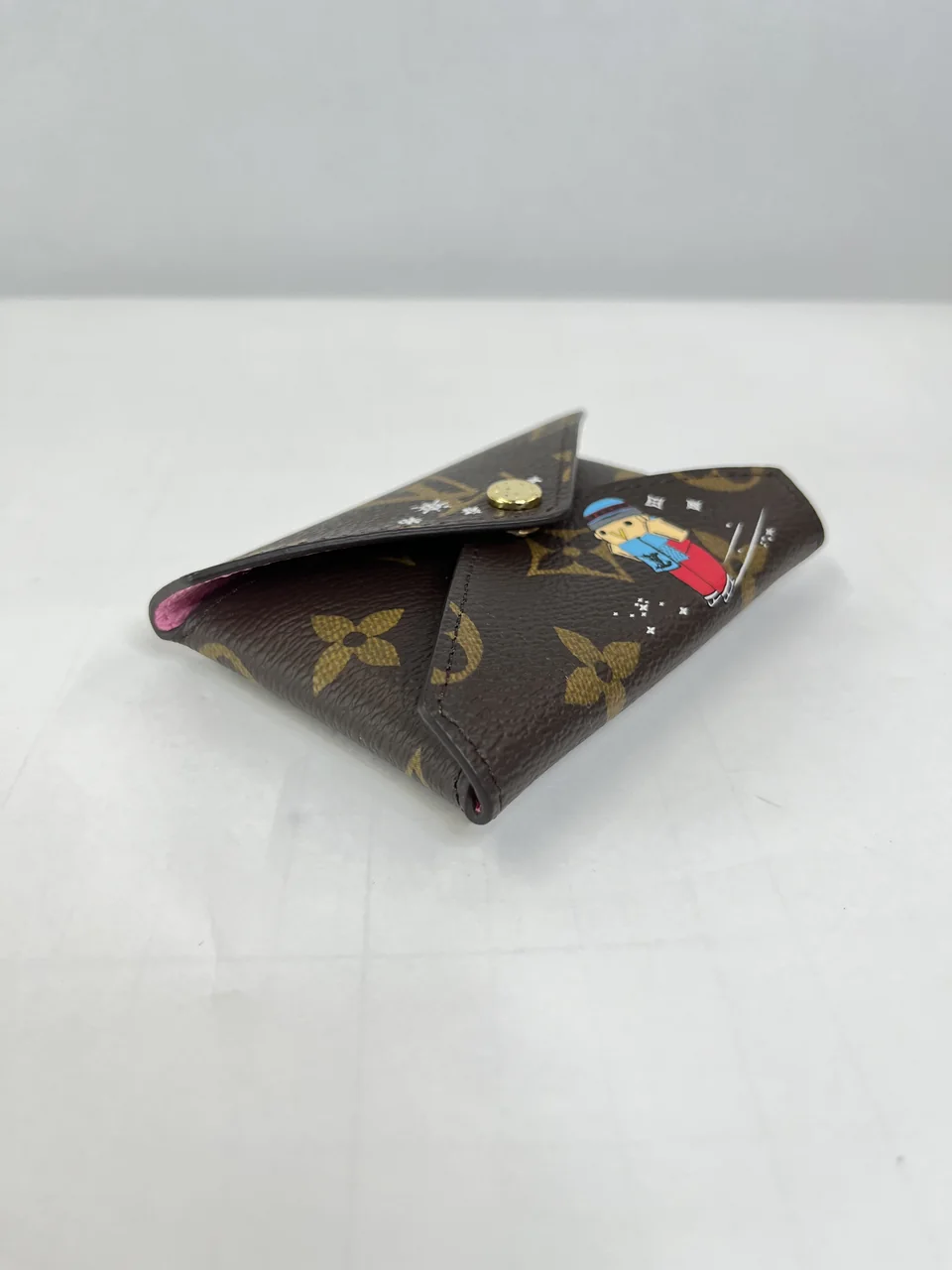 LV VIVIENNE POCHETTE KIRIGAMI view 11