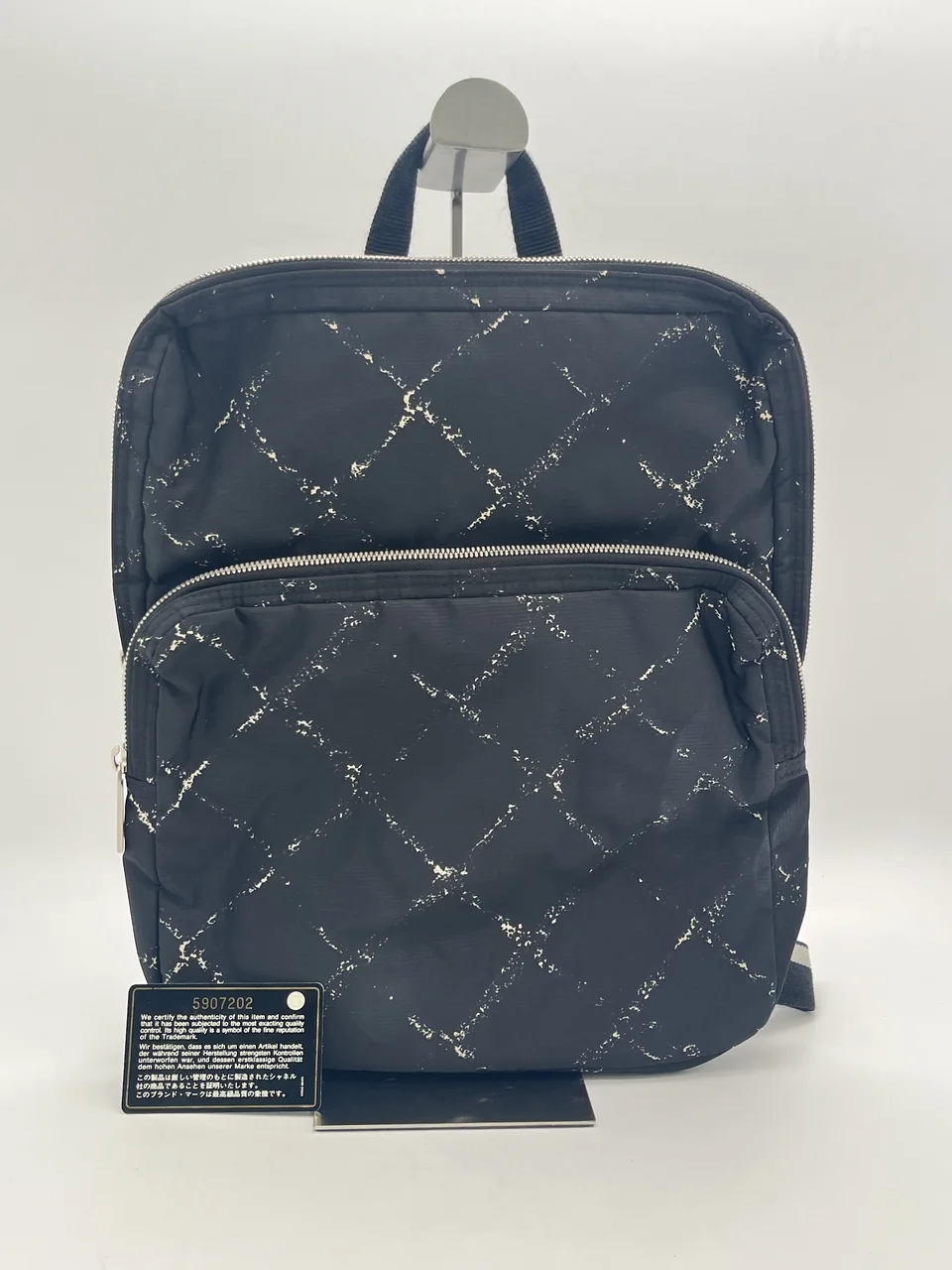 CHANEL TRAVEL LINE BACKPACK