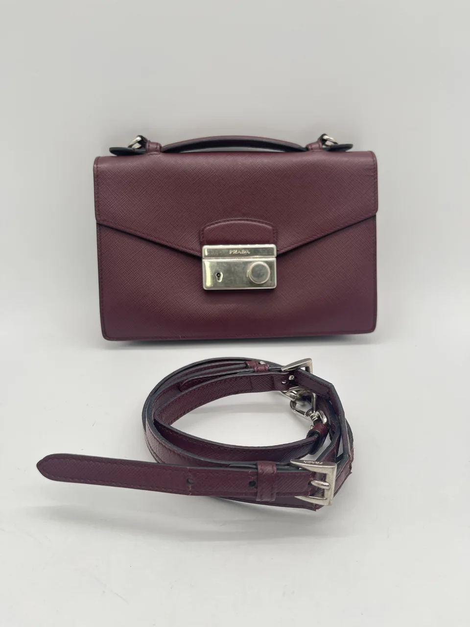 PRADA BORDEAUX (CATEGORY TO BE CONFIRMED)