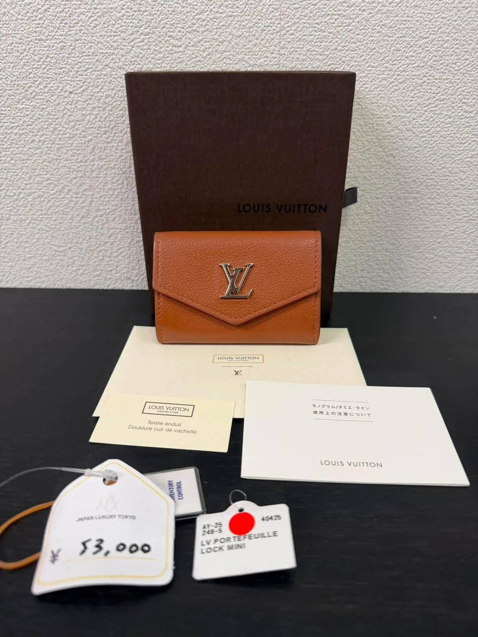 LV PORTEFEUILLE LOCK MINI photo 3