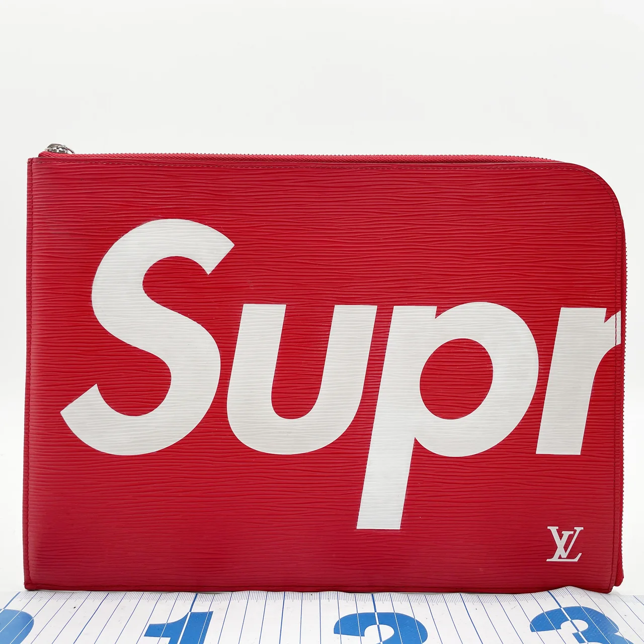LV EPI POCHETTE JOUR GM