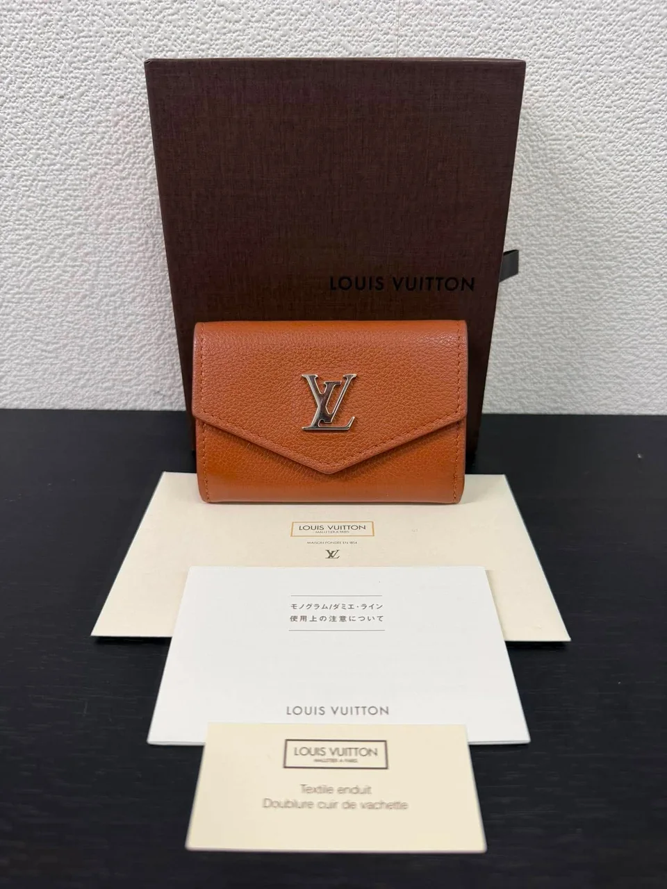 LV PORTEFEUILLE LOCK MINI